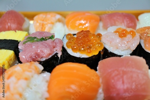 Assorted temari-zushi (ball-shaped sushi) purchased at a supermarket in Tokyo, Japan