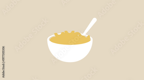 A bowl of cereal with a spoon.