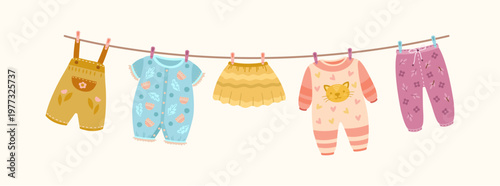 Vector illustration of clean pink newborn dresses and socks hanging on a laundry rope with clothespins to dry for a baby boy or girl