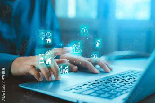Smart real estate management home automation AI IoT concept hands typing laptop with digital hologram house energy family security cloud icons, digital transformation, Proptech data analysis