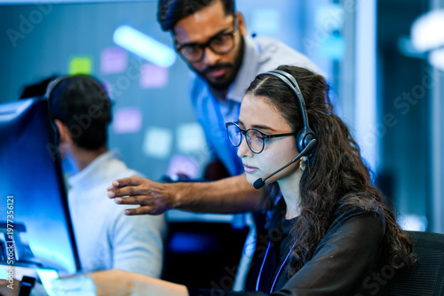Photos Call center quality assurance supervisor monitoring agent performance protocols