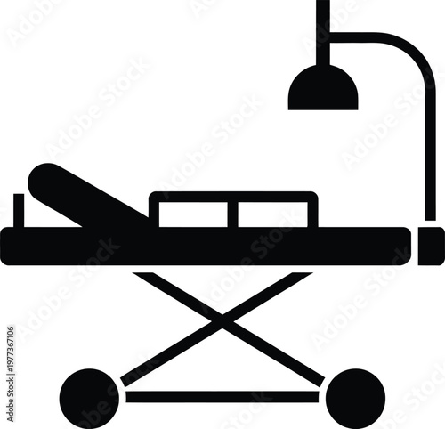 Black silhouette of a hospital gurney with an adjustable backrest and an overhead surgical lamp mounted on a wheeled frame for patient transport in a medical facility or emergency room setting
