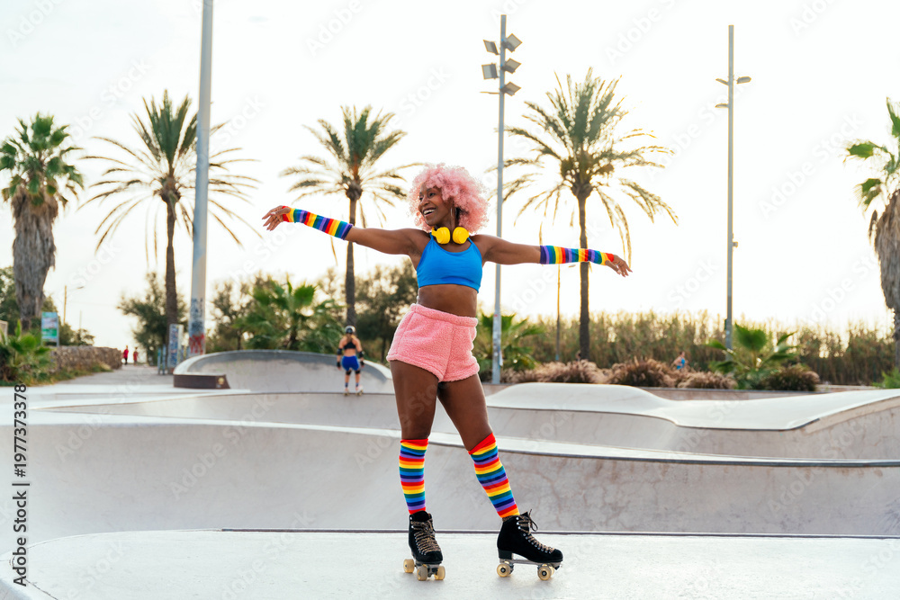 Obraz premium Beautiful woman skating with roller skates and having fun.