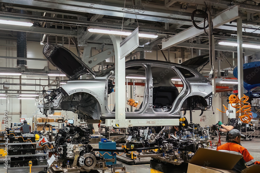 Naklejka premium Modern car assembly line workshop