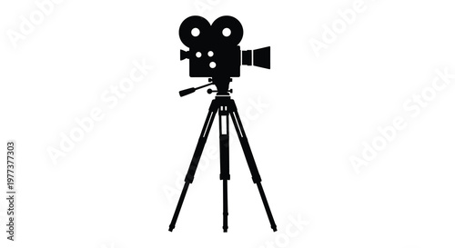 Vintage movie camera on tripod a striking black form silhouette