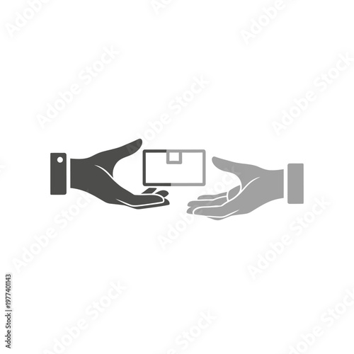 Hands passing a credit card.