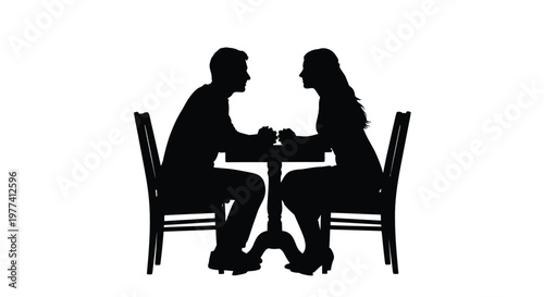 Couple dining together at a table a romantic black silhouette