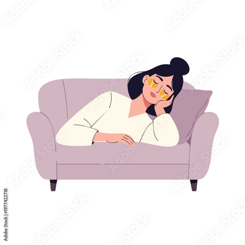 Woman relaxing on a couch with eye patches.