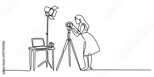 A continuous line drawing of a female photographer working with a camera on a tripod in a studio Vector, illustration