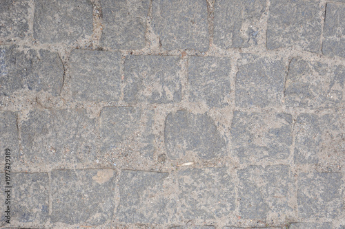 Bild auf Leinwand Old stone pavement texture, top view