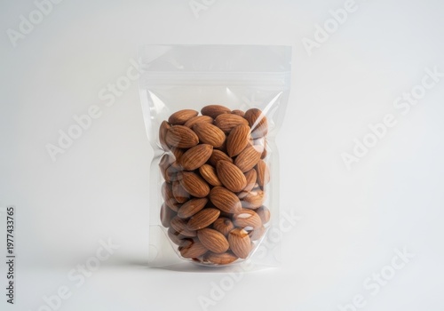 Almonds in a clear plastic pouch isolated on white background