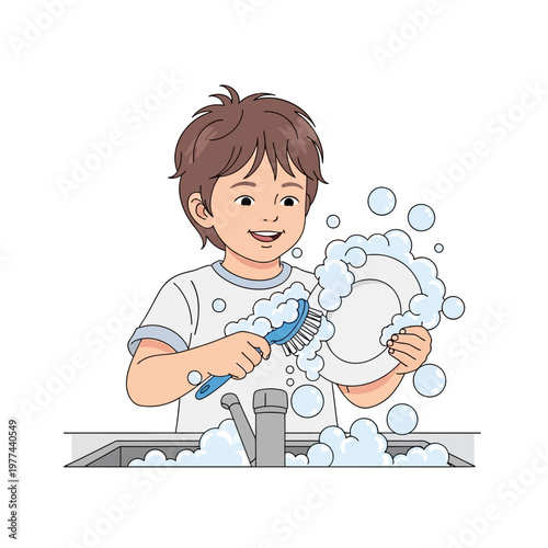 Young boy happily washing dishes with a brush in a soapy sink