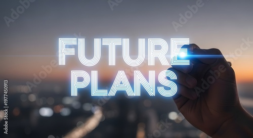 Hand Writing Future Plans on Transparent Screen with Blue Light at Sunset over Cityscape