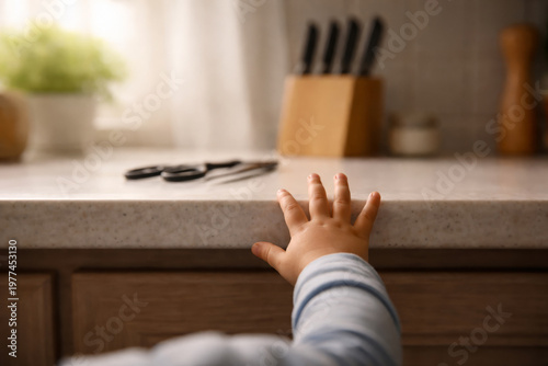 Baby Hand Near Kitchen Scissors