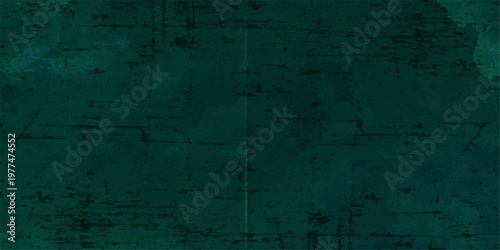 A dark textured green grunge wall background features an aged vintage pattern with a rough surface of worn paint and dirty antique paper textures