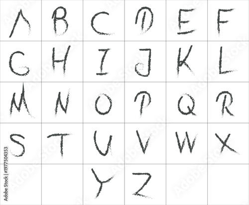 Handwritten alphabet letters in a grid layout