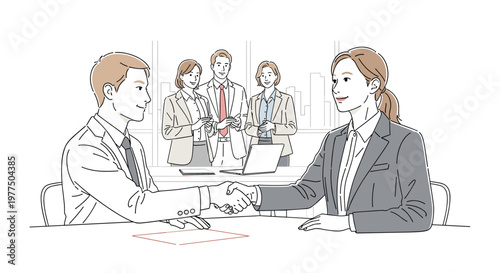Two professionals in business attire shake hands across a table, symbolizing partnership and agreement, while colleagues observe in the background with a modern office setting