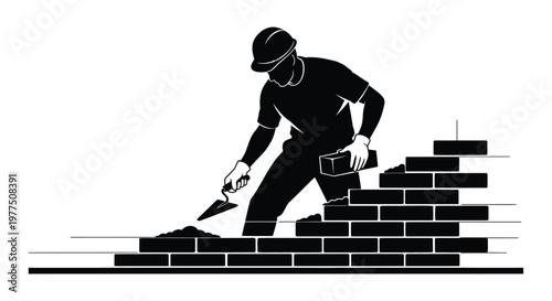 Construction worker building a brick wall depicted in bold silhouette