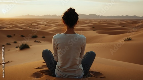 Wallpaper Mural Woman meditating in desert at sunrise Torontodigital.ca
