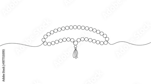 Islamic prayer beads tasbih with tassel on white background spiritual meditation and devotion