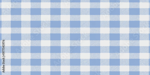 A seamless blue gingham fabric texture with a checkered plaid pattern on cotton cloth material for a picnic tablecloth or textile backdrop design