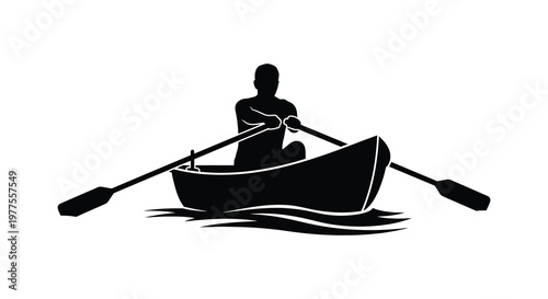 A lone rower in a small boat on water dramatic silhouette