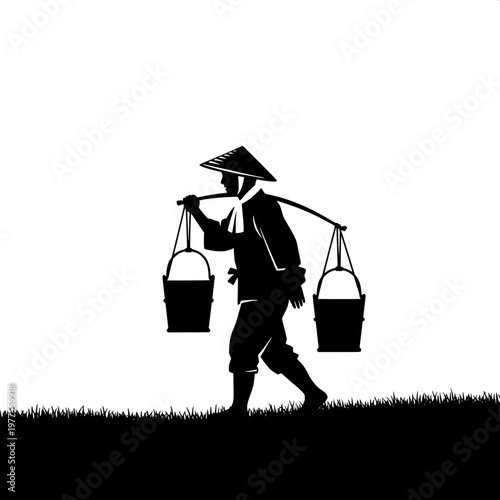Traditional farmer carrying balanced water buckets on shoulder pole in silhouette at dusk