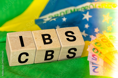 Brazil Finance and taxes. IBS and CBS written on a wooden block IBS. Concept, Brazilian tax reform, simplification of VAT in two local IBS fees for goods and services and the Federal CBS contribution.