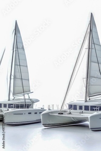 Two boats tied together alongside a dock or harbor wall. vertical frame