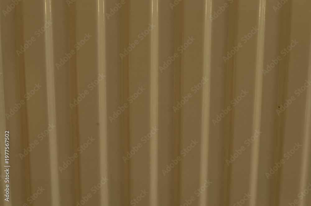 Fototapeta premium Beige vertical metal ridges texture background