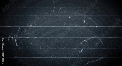 Chalkboard with erased blackboard lines.