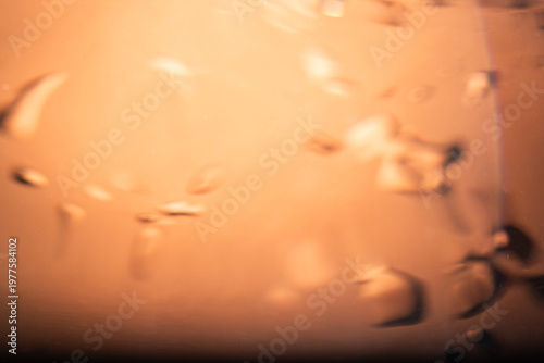 327.Abstract Orange Glow with Fluid Bubble Patterns