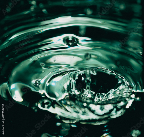 412.Liquid Crown Splash on Dark Surface