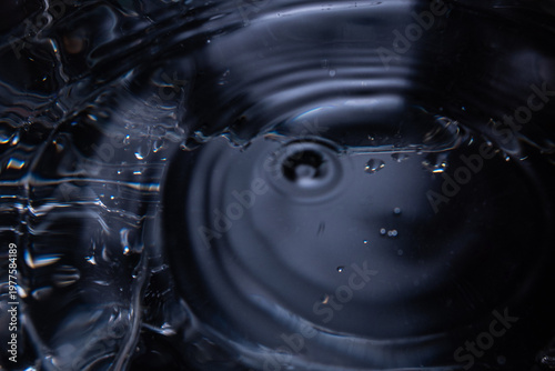 455.Purple Water Ripples With Central Impact And Motion