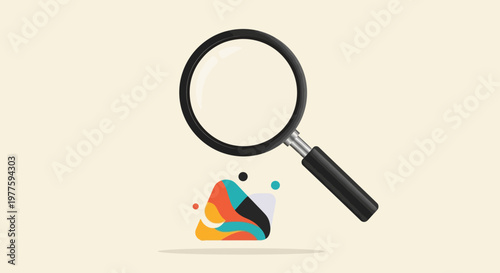 Magnifying glass over colorful triangle.