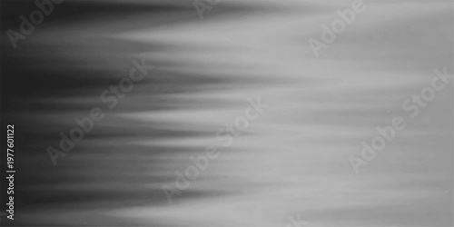 A shiny brushed silver metal texture background with a grey stainless steel pattern and dark industrial chrome surface design for a metallic aluminum backdrop