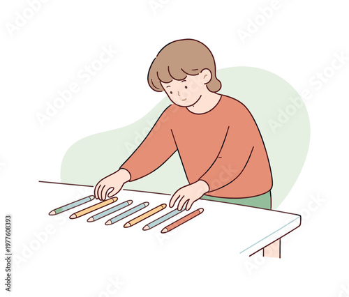 Organized Pen Arrangement. Soft person arranges pens in parallel lines, rotating each gently while checking spacing across a clean