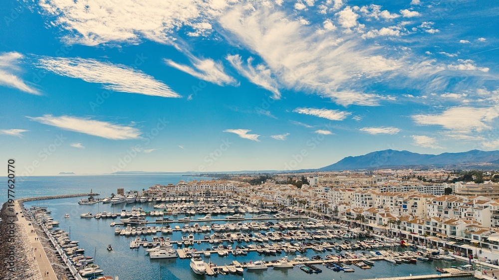 Obraz premium Puerto Banús marina aerial view with luxury yachts and waterfront, Marbella, Costa del Sol, Spain