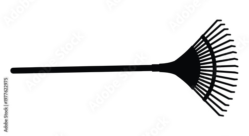 Black garden rake isolated on a white background silhouette