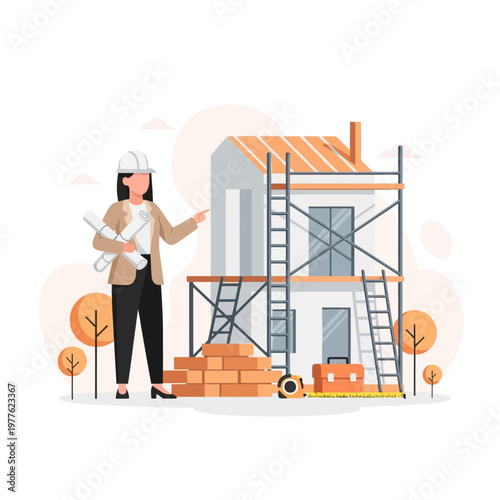 A woman in a hard hat explains construction plans beside a house on scaffolding with tools and bricks nearby outdoors.