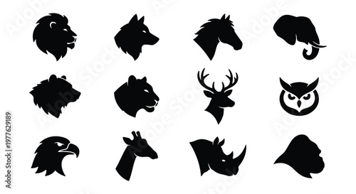 Minimalist wild animal head silhouettes, set of 12 black vector icons, modern wildlife mascot logos including lion, wolf, eagle, and elephant