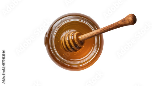 Golden honey in glass jar with wooden dipper, isolated on transparent background