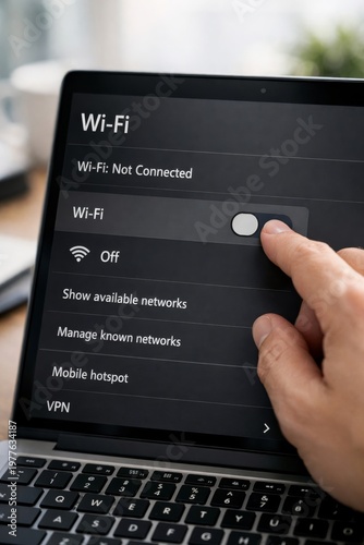 Person turning off wi-fi on laptop tablet screen showing not connected and network settings