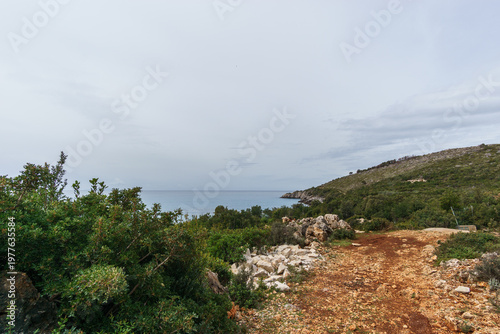 Gravel road along the albanian Adriatic Cost near Aquarium Beach, Himare, Albania