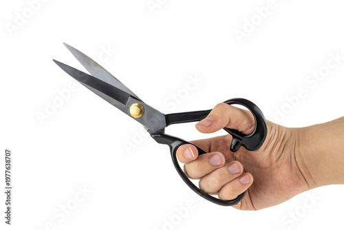 Close-up of hand holding scissors at angle isolated on white background. Perfect for design, editing, and crafting concepts. PNG transparent version included.