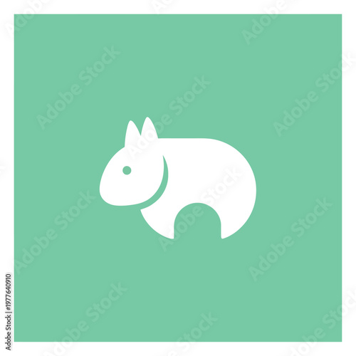 Minimalist white wombat icon on a green background.