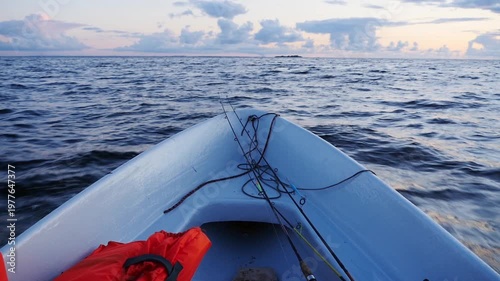 fishing boat on the open sea moves along the waves. Slow motion, first-person view