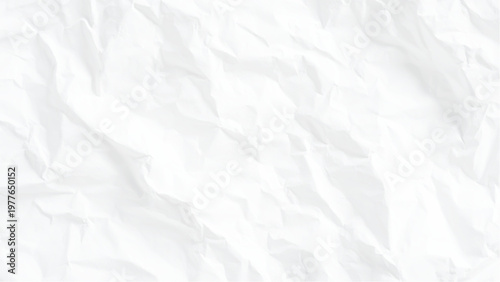 Crumpled white paper texture background with creases and folds blank and empty surface
