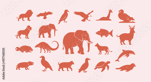Set of diverse wild animal silhouettes including elephant lion bird fish turtle and dolphin icons.