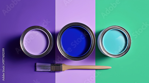 open paint cans in blue and lavender with paintbrush on purple surface against mint green and purple split color-blocked background